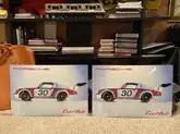 Two Limited Production Authentic Porsche 911 Carrera RSR Turbo 2.1 Enamel Signs (24" x 16")