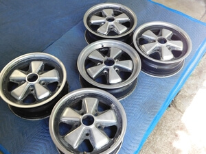 Five 6" x 15" OEM Porsche Fuchs wheels