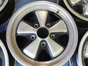 Five 6" x 15" OEM Porsche Fuchs wheels