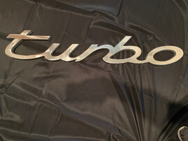Authentic Porsche Dealership Turbo Sign (50" x 9")