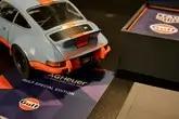  Tag Heuer Gulf Watch and 1:18 Scale Carrera RSR Model