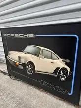 DT: Neon Illuminated 1980s Porsche Advertisement