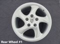 NO RESERVE: OEM 18” Porsche Solid Spoke Turbo Twist Wheels