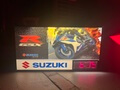 Pair of Authentic Illuminated Suzuki Dealership Signs